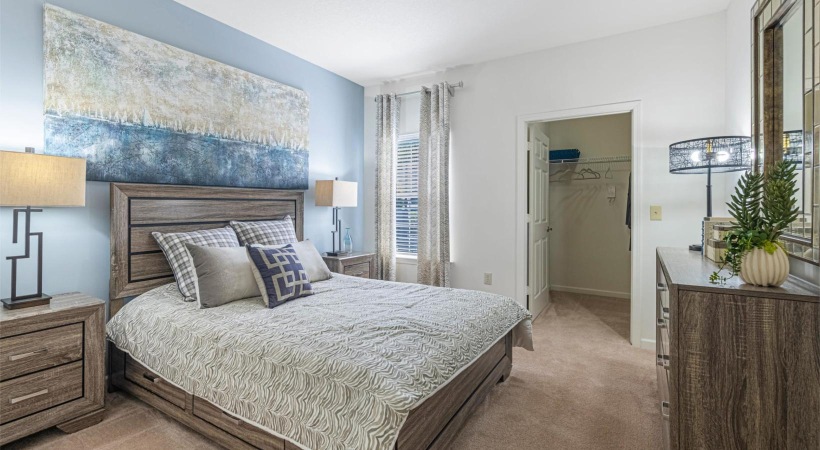 a bedroom with a large bed