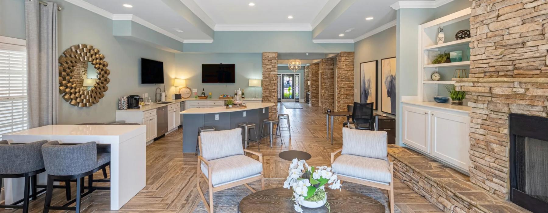 a large living room with a fireplace